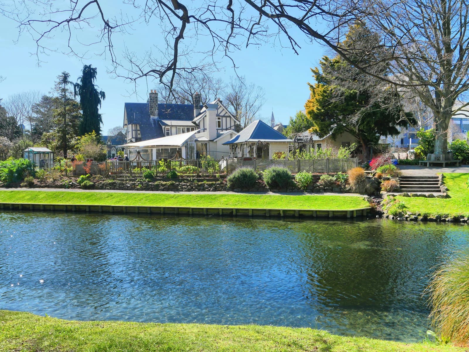 The Avon River and gardens in central Christchurch on a clear day